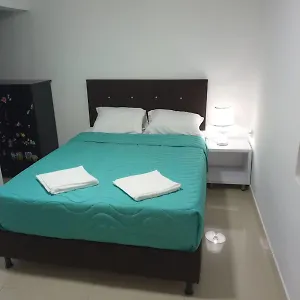 Habitación en casa particular En Apartamento Central, Cerca De Sitios Turisticos Jardin Botanico Y Metro Estacion Universidad